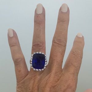 Large blue sapphire simulated ring with cz.